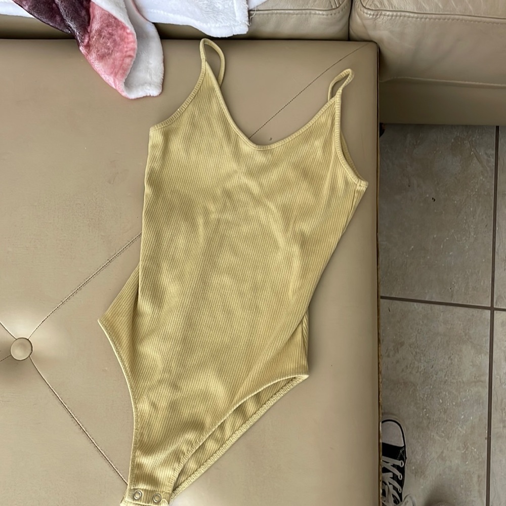 Yellow body suit
